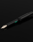 Ball Tipped Classic Pump Pen on black background