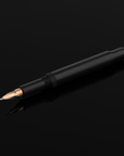 Brause Rose Classic Fountain Pen with Overfeed on black background